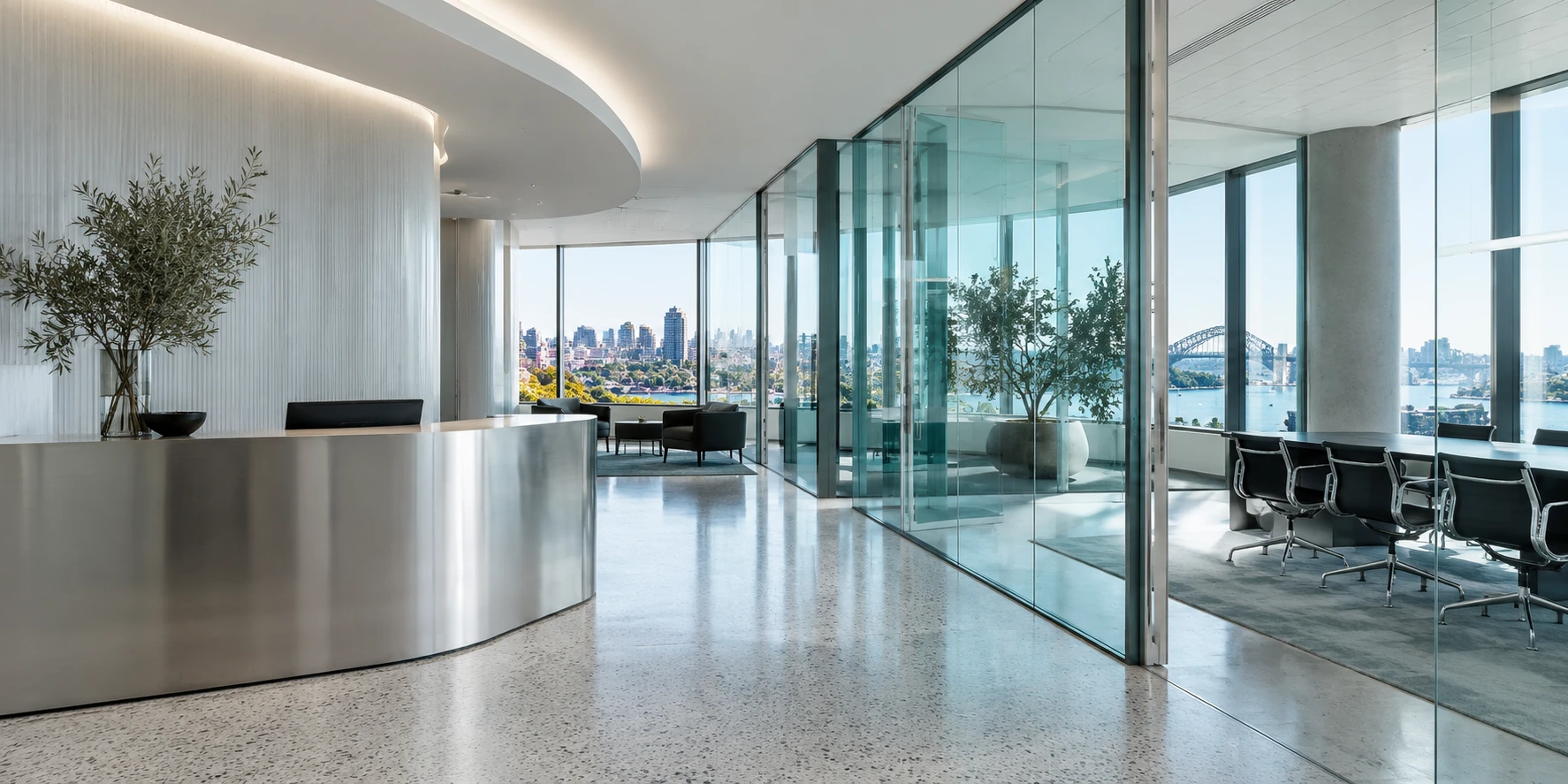 A bright contemporary workplace with glass, stone and stainless steel